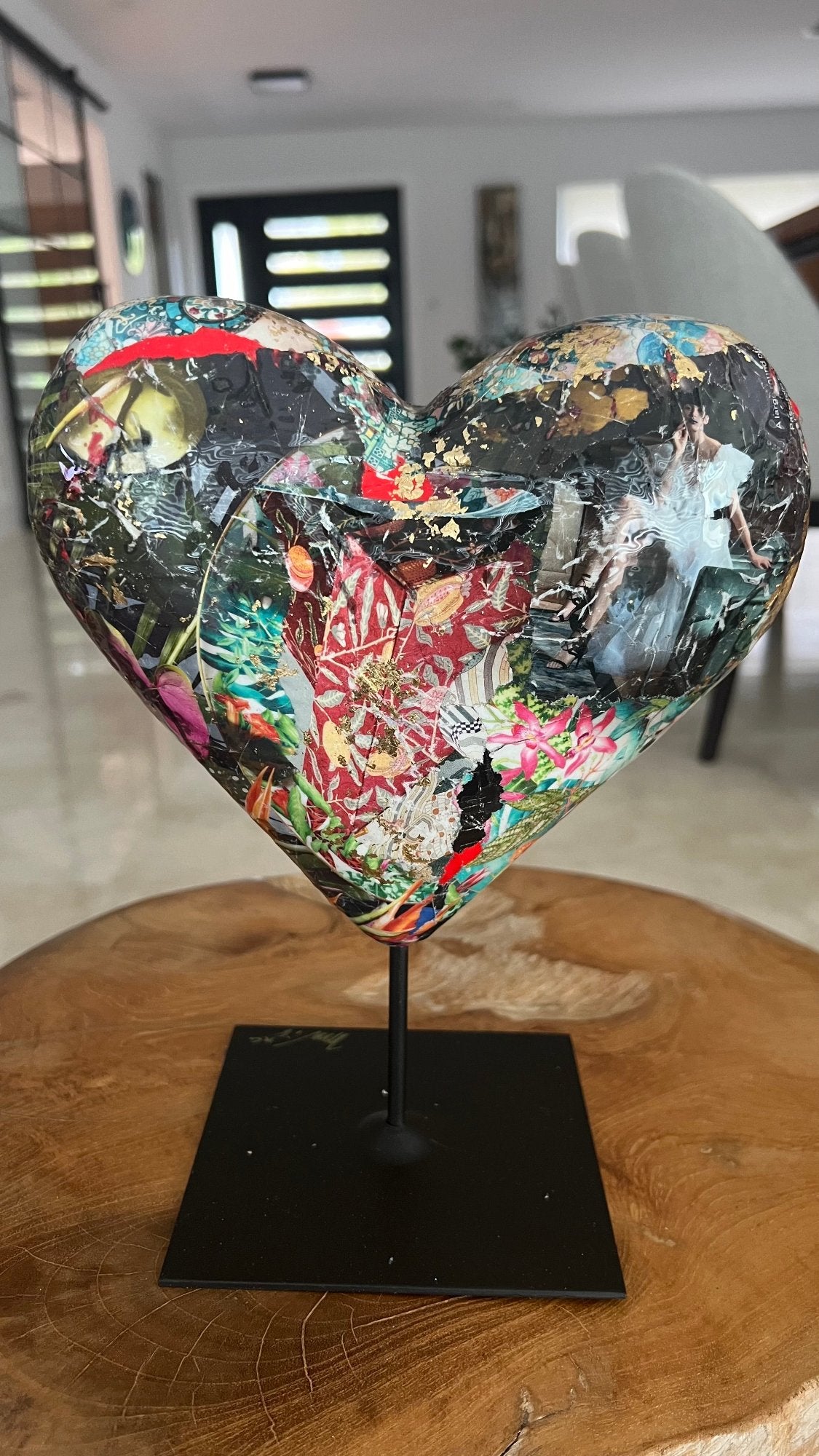 Mixed media heart sculpture with vibrant collage artwork and gold leaf for modern decor